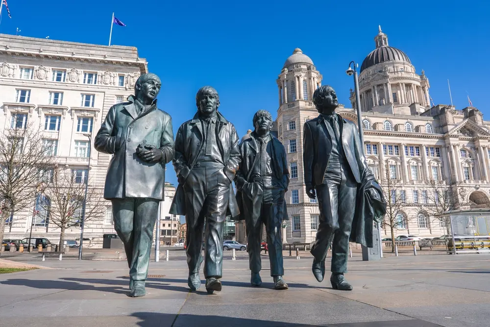 The Beatles statue at Liverpool Waterfront overlooking the Royal Albert Dock, a popular landmark for visitors and major city events